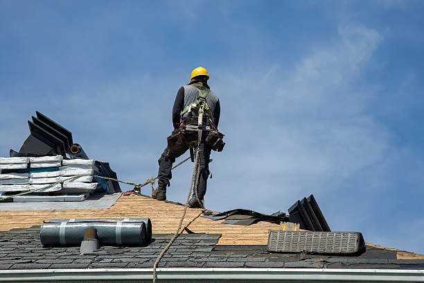 Professional Roof Replacement technician working in Wenham, MA